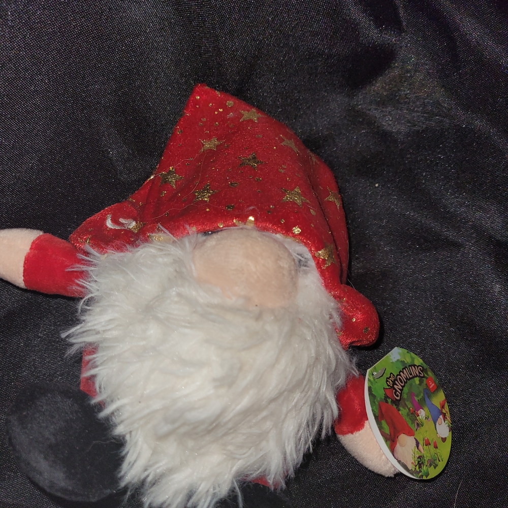 Red and White Stuffed Gnome Toy